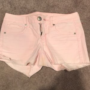 Light pink corduroy American Eagle shorts. 4